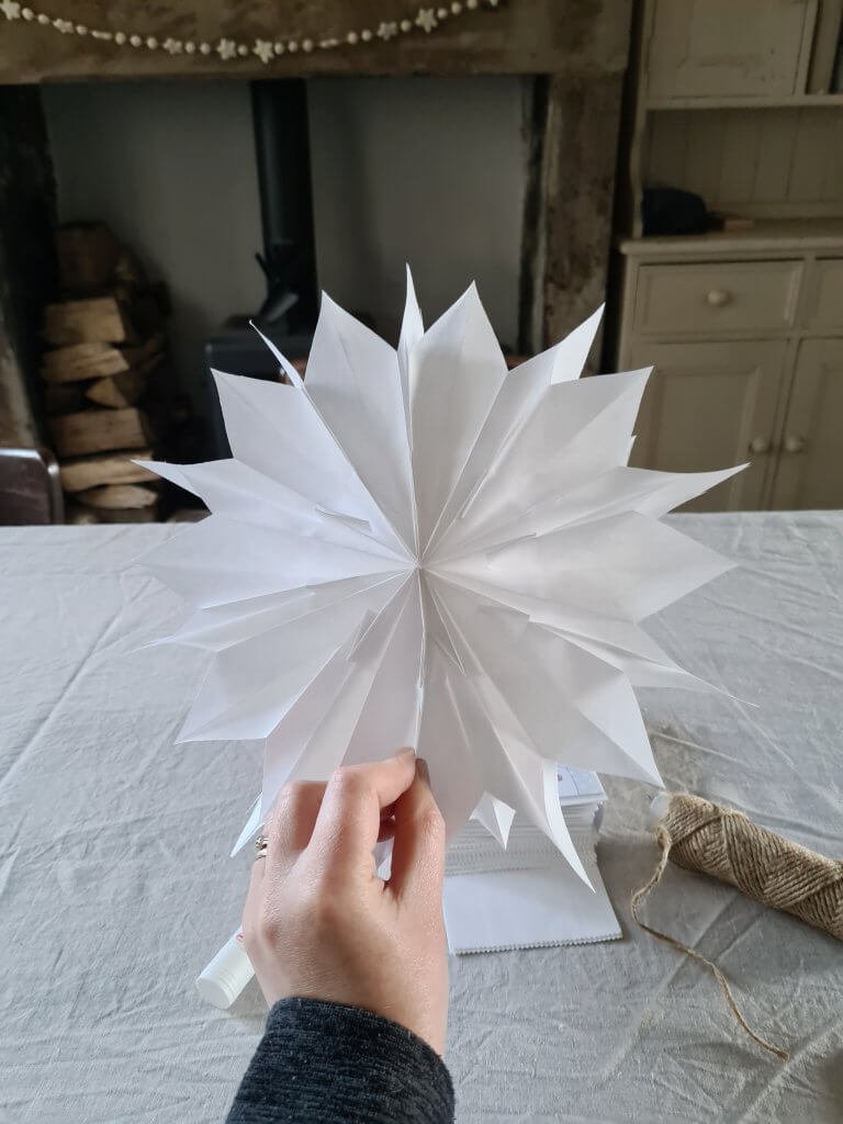 White paper bag stars in progress