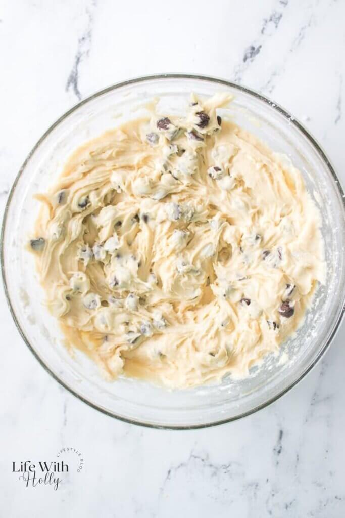 A mixing bowl with muffin mixture