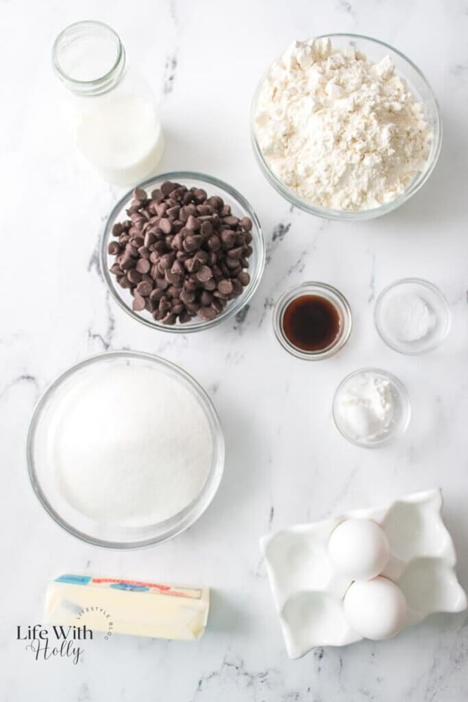 A top down photo showing the ingredients to make simple chocolate chip muffins