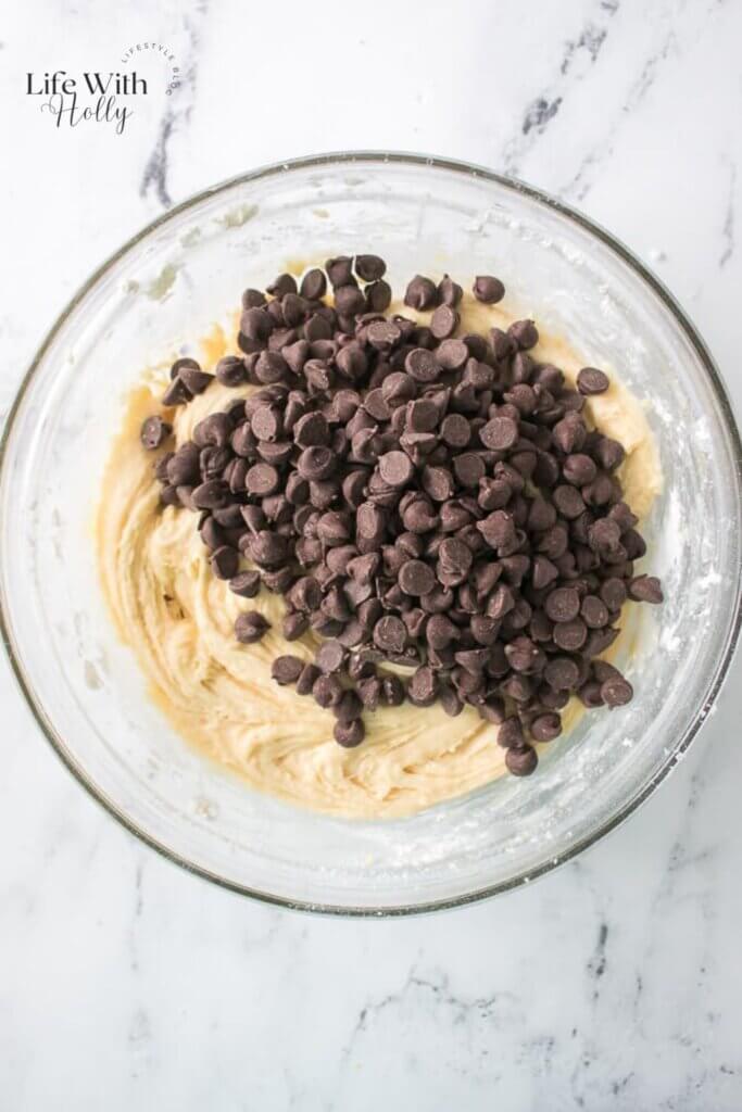 A mixing bowl with muffin mixture
