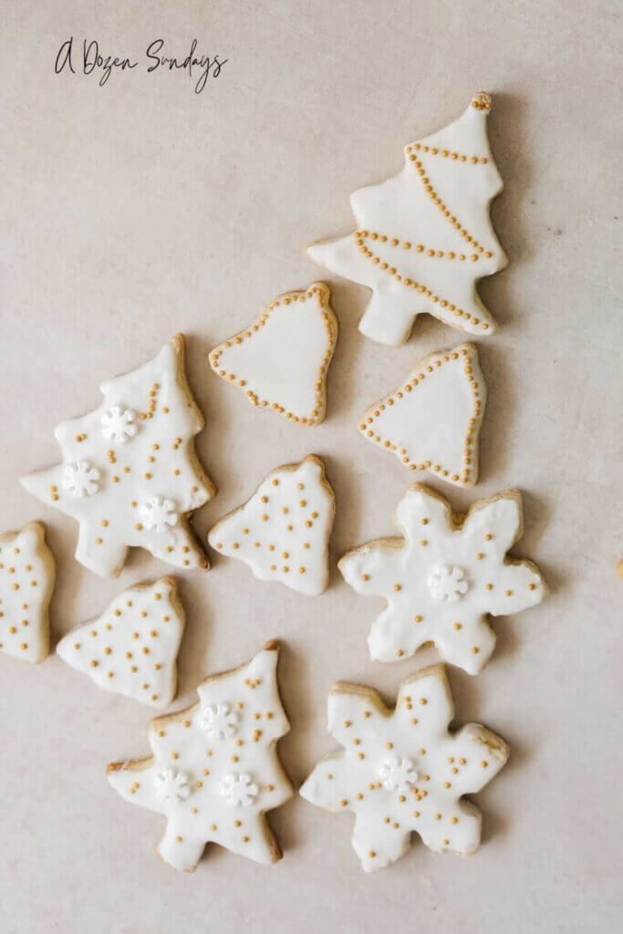 white and gold iced Christmas cookies