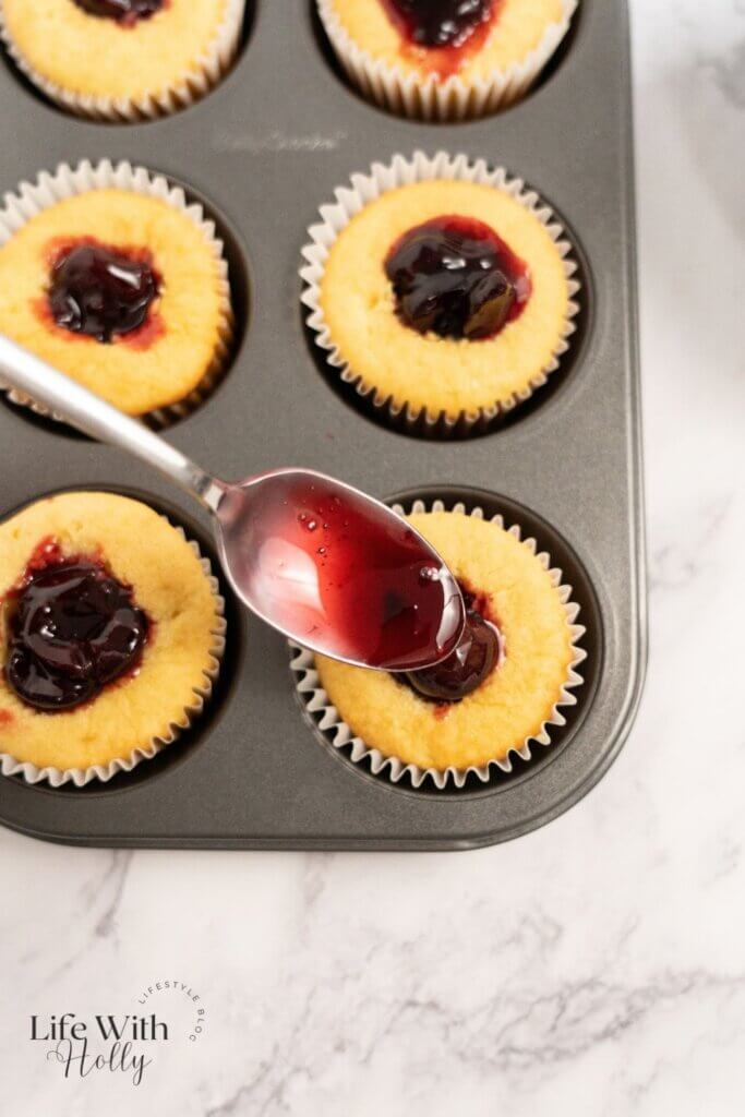 Filling the White chocolate cherry cupcakes